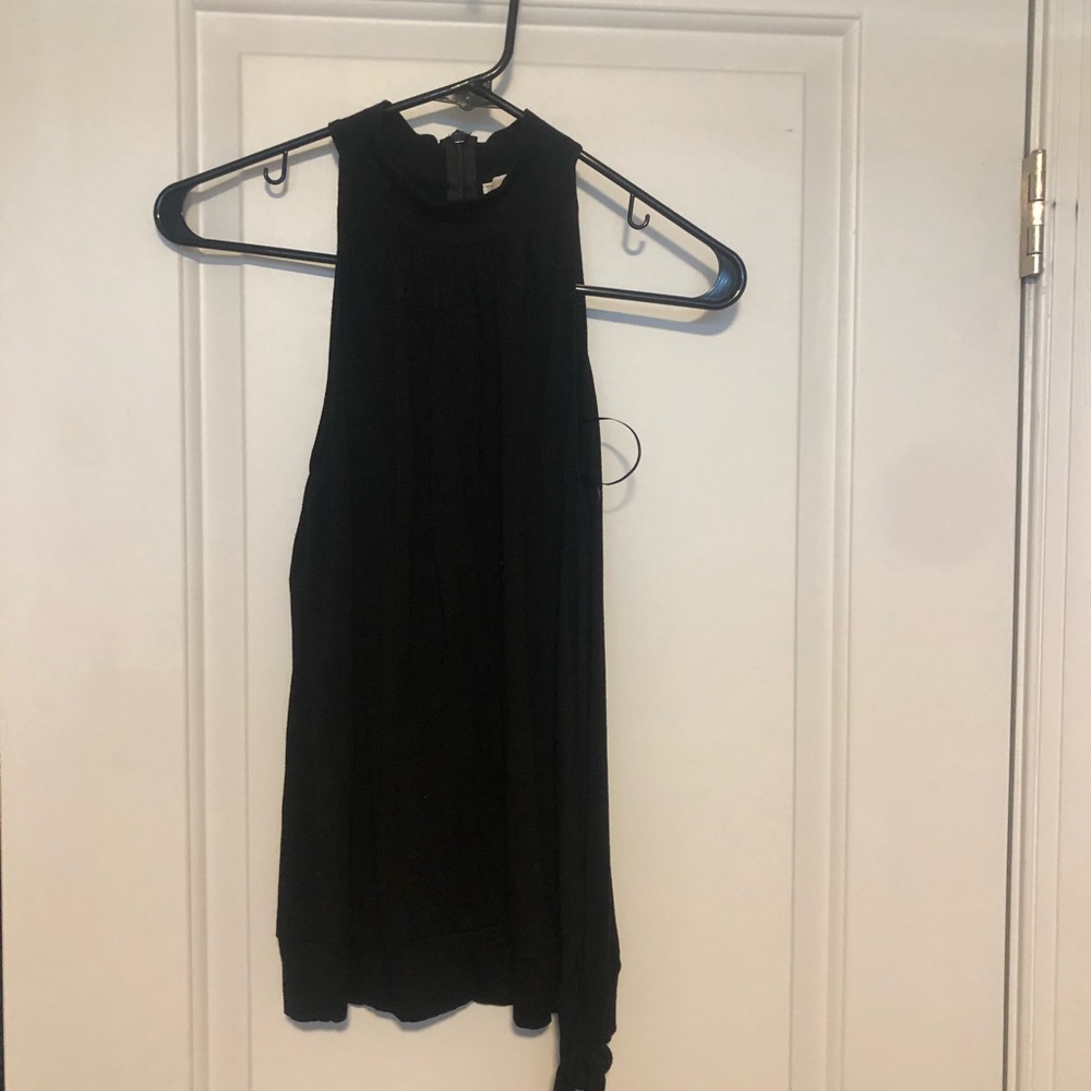 Flattering black Michael Kors tank with a side tie